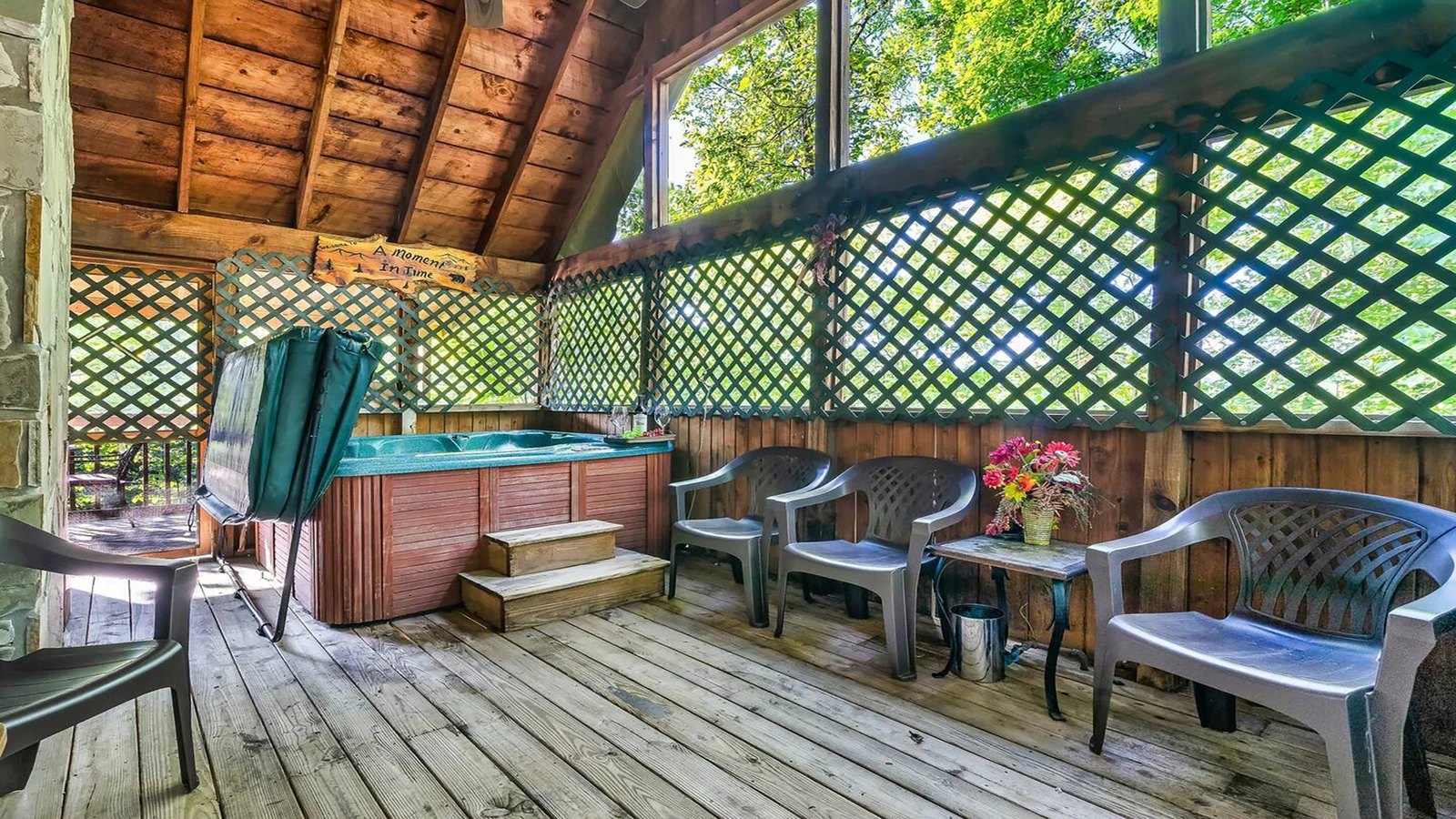 There's plenty of porch seating along with a nice family sized hot tub.