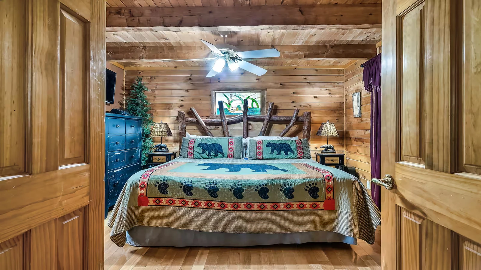 Your cabin's king sized log bed, great for nights of relaxation.