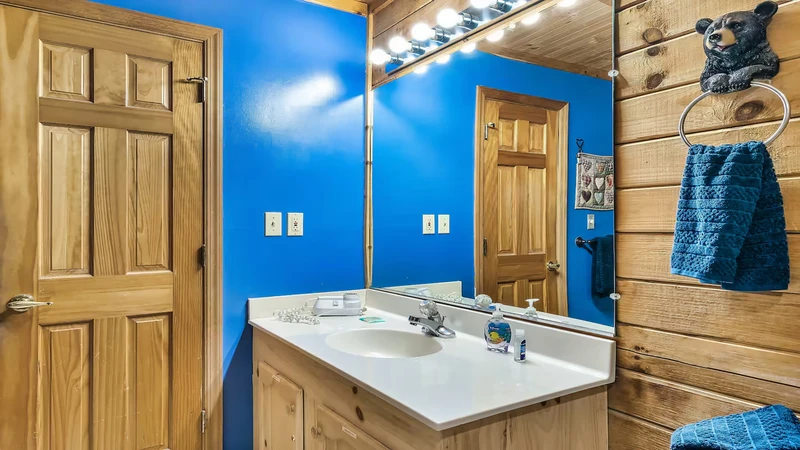 Getting ready for adventures in the area made easy with the cabin's full bath.