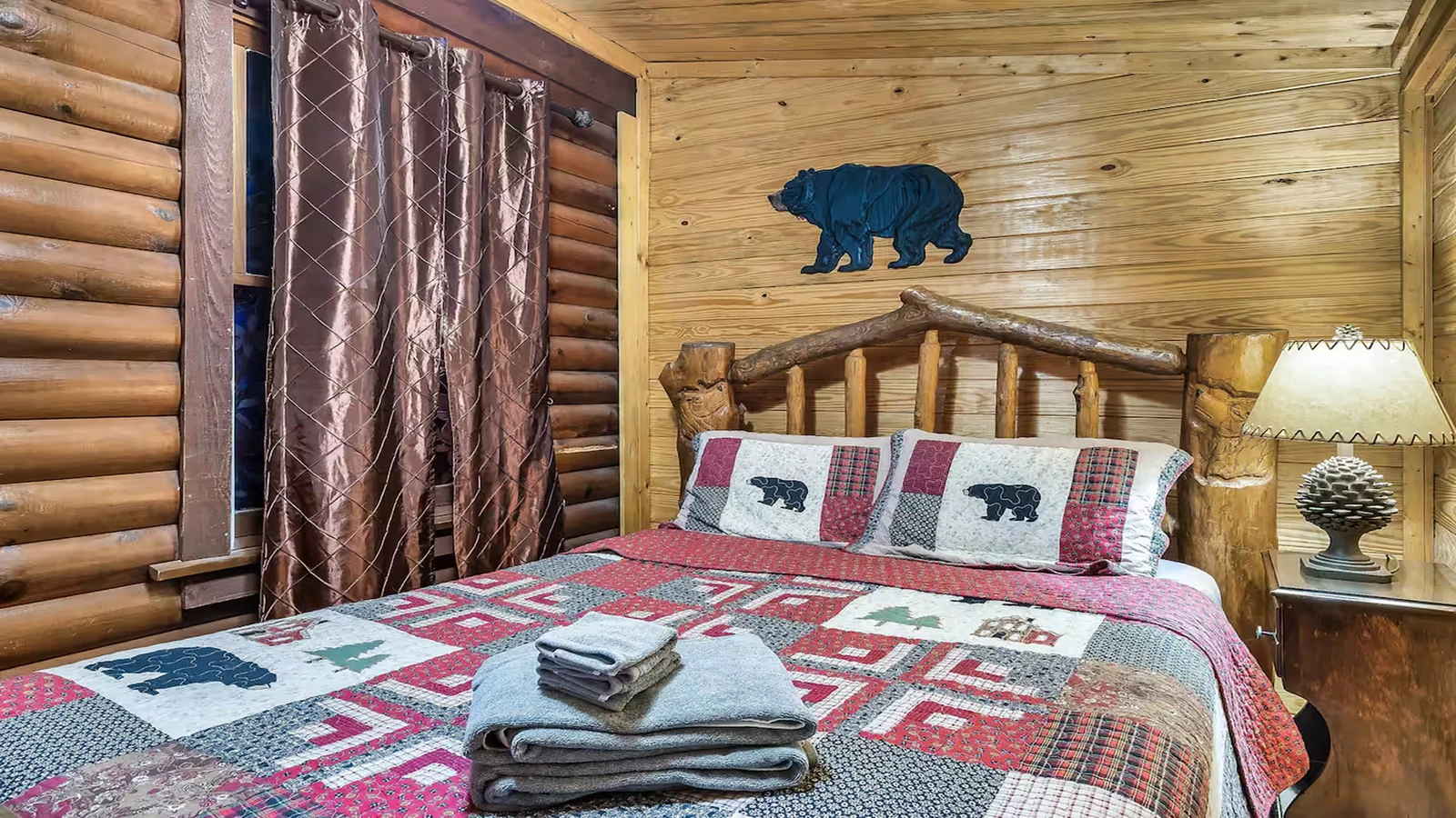 Queen sized log bed at your cabin in the Smokies.