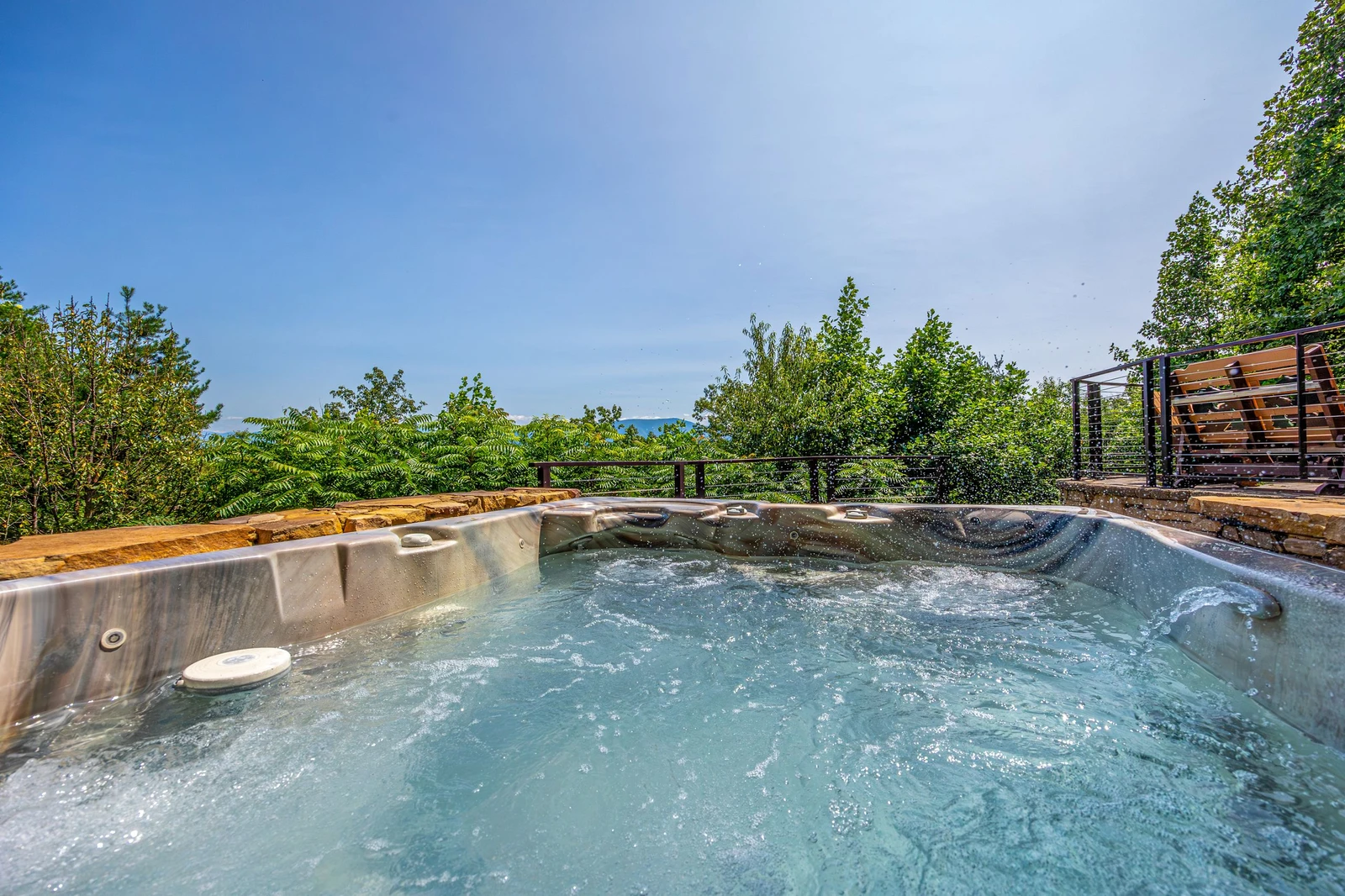 The family will enjoy all the space this cabin's hot tub offers.