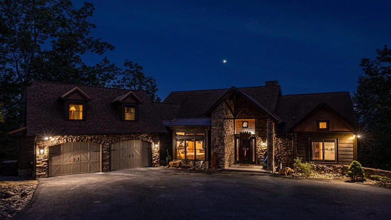 Well lit vacation cabin in the Smokies with a privacy gate.