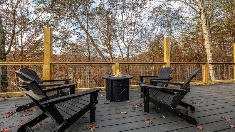 Mountain Whispers gas fire pit on the deck.