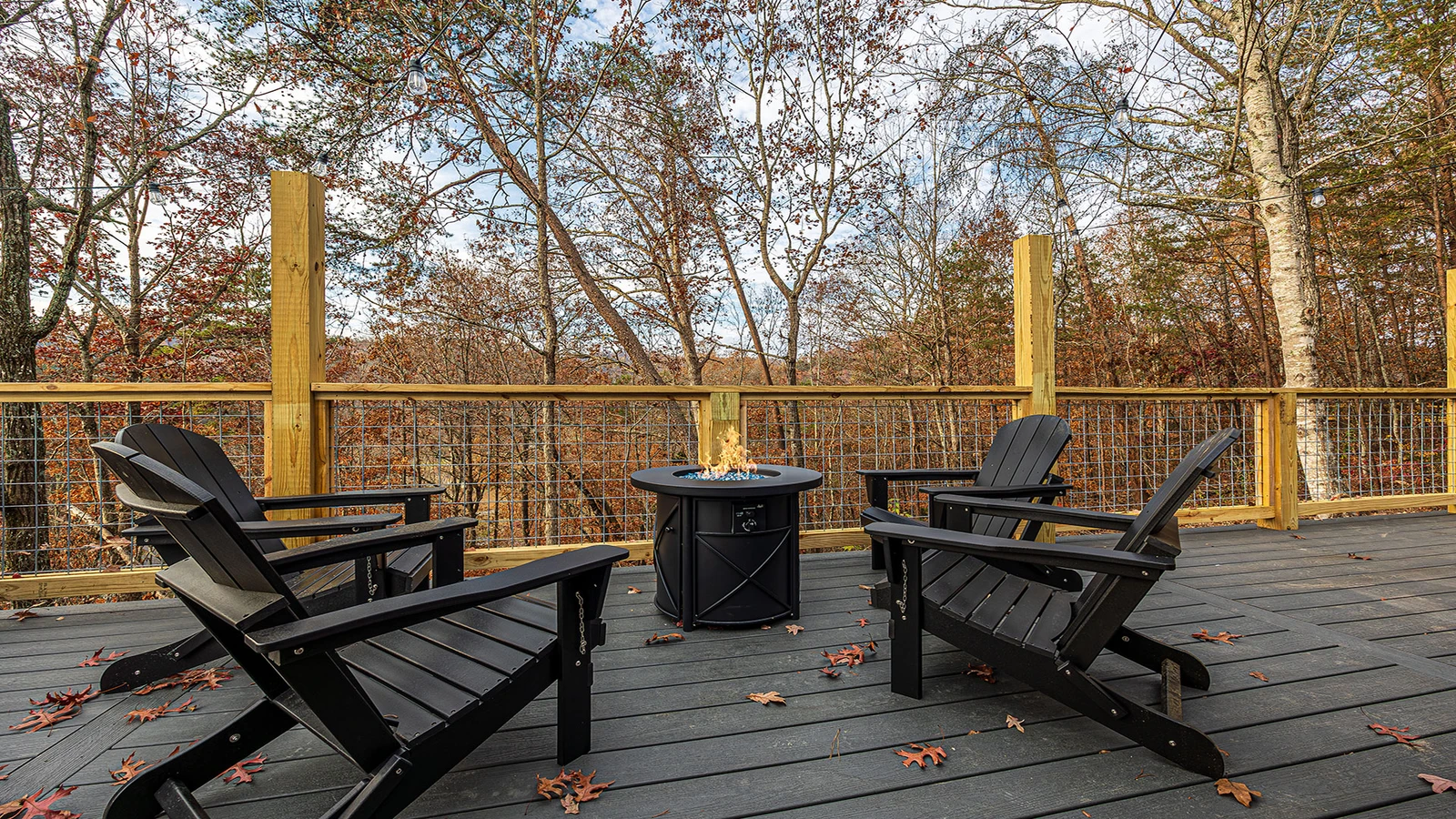 Mountain Whispers gas fire pit on the deck.