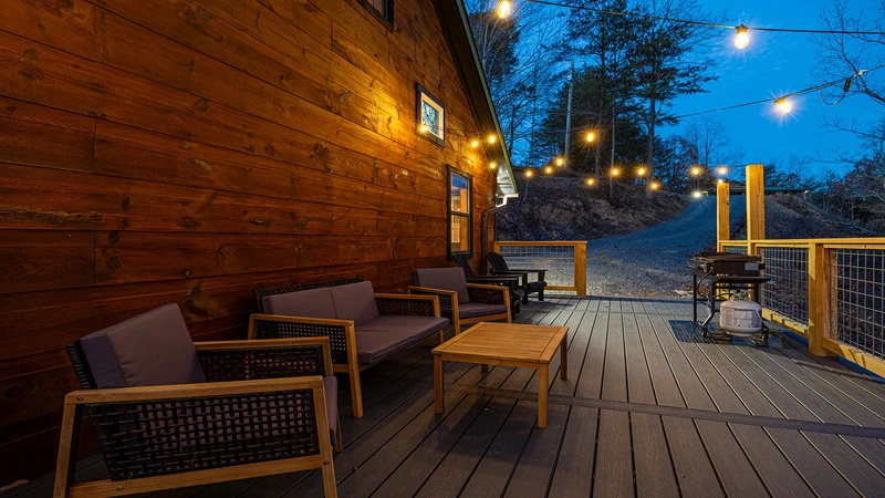 Mountain Whispers twilight deck photo.