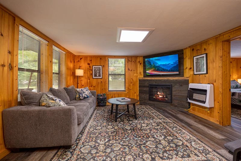 Angled phot of your rental cabin living room.