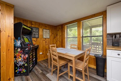 Multiplayer arcade game and dining area.