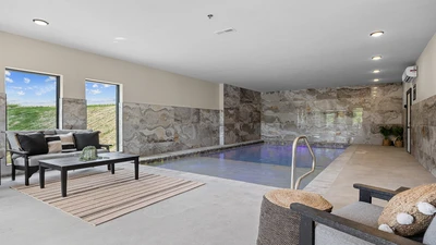 Gang come enjoy this big cabin with indoor swimming pool, lots of indoor and outdoors entertainment amenities. 