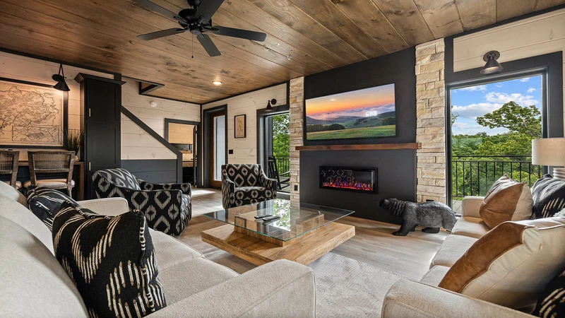 The whole family can relax around the beautiful fireplace while watching the big screen tv.