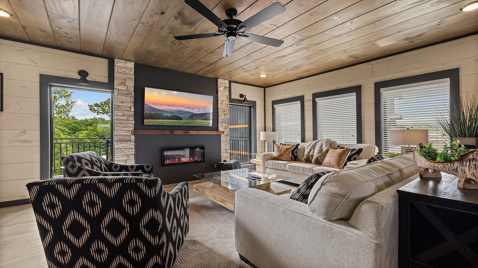 Furniture throughout this Smoky Mountains big cabin are classy.