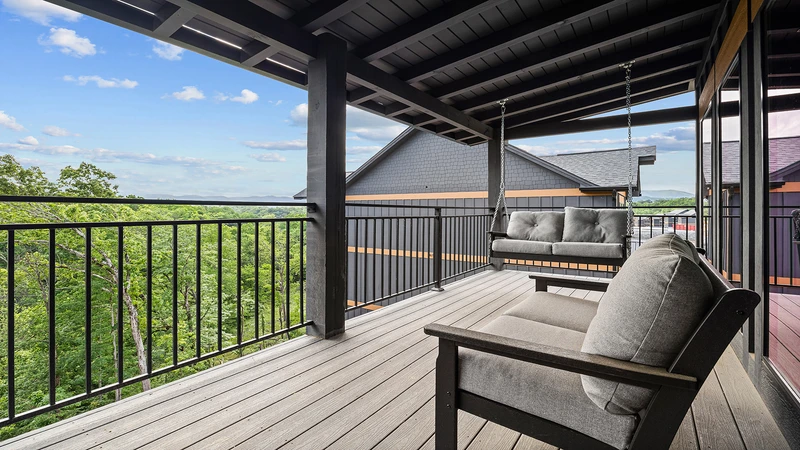 Porch swing and seating at your large cabin in the Smokies.