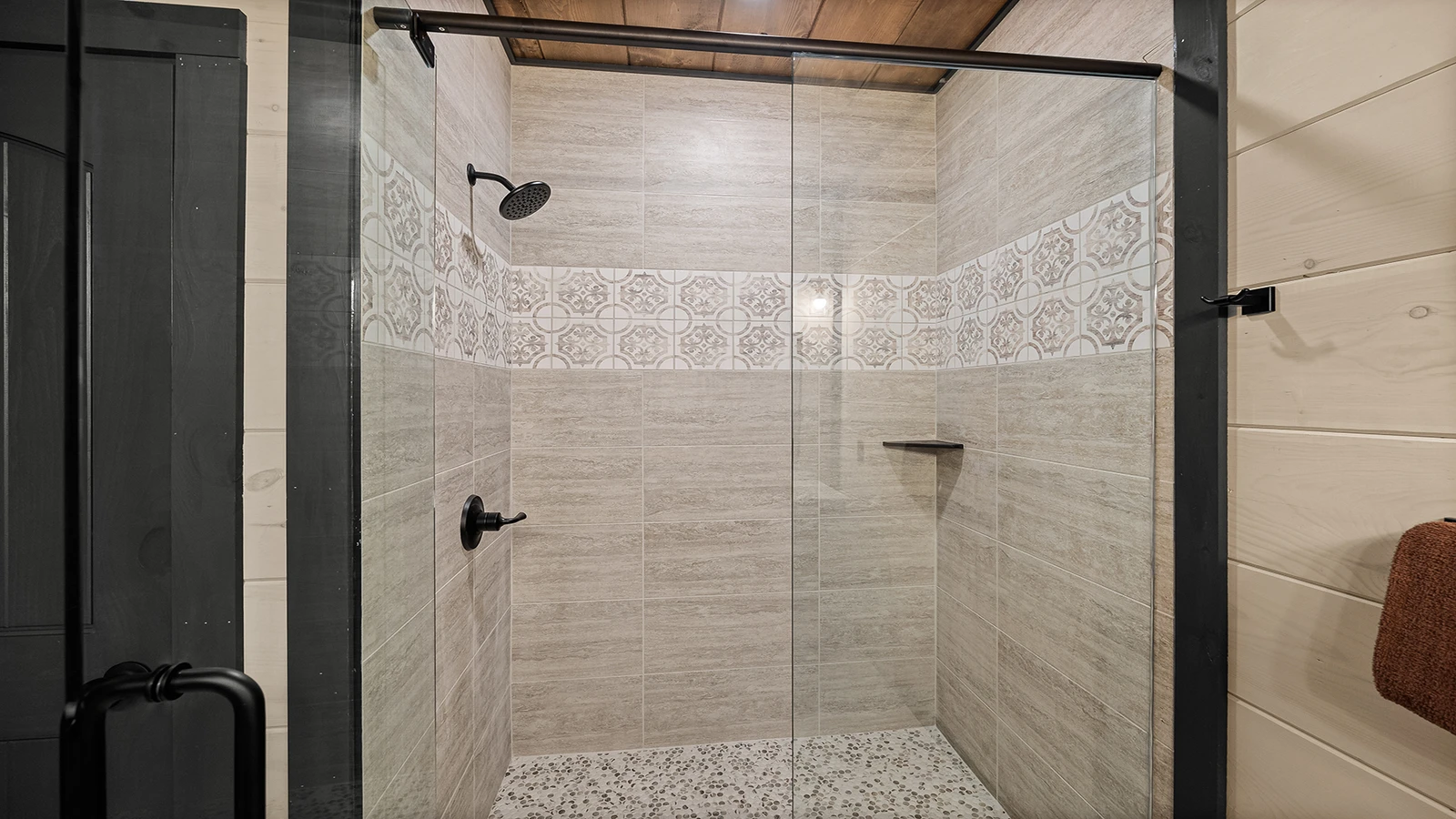 Close up of the walk-in glass shower.
