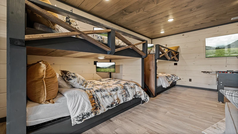 Each of the four bunkbeds have their own TV.