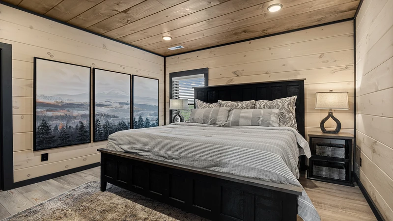 Upstairs third bedroom in this large spacious resort cabin. 