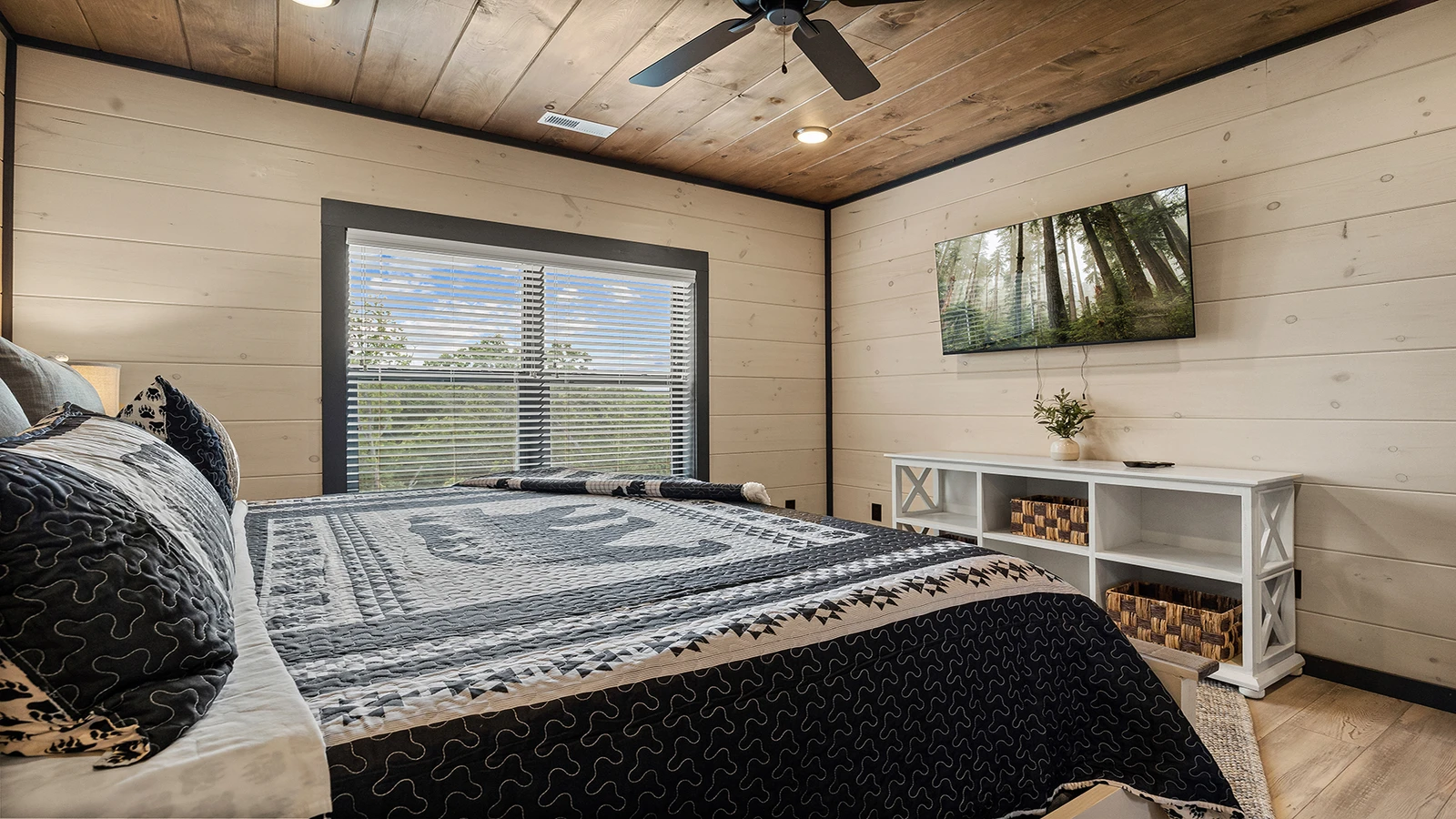 Note the large TV and spaciousness of your cabin's fist bedroom.