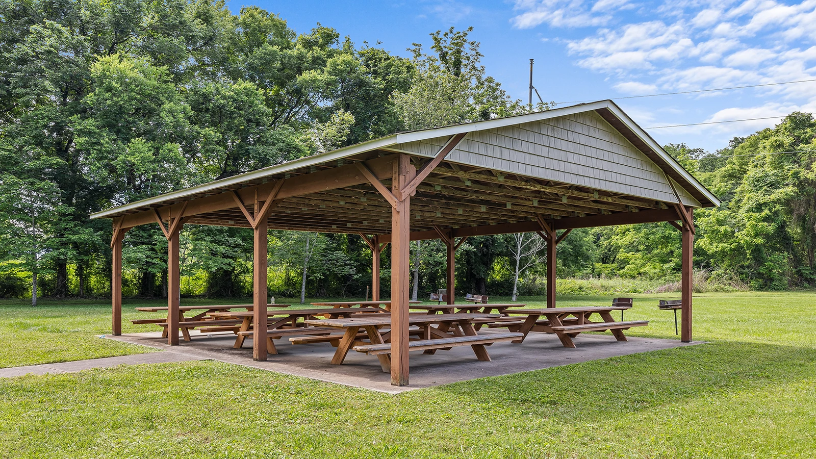 The family can enjoy picnics under the pavilion with several charcoal grills available.
