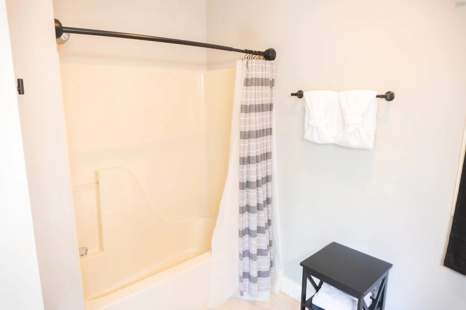 Your cabin's full tub and shower combo.