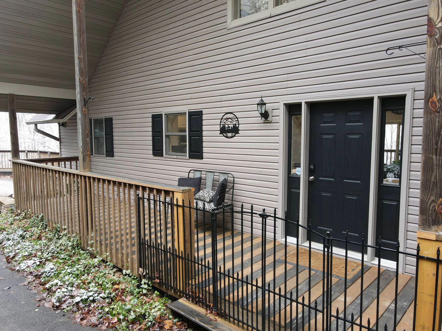 Side porch for stepping out and listening to nature.