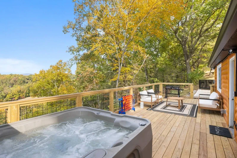 Sit back in your cabin's hot tub and enjoy Smoky Mountain views. 