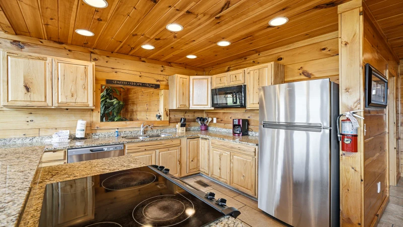 Meals to late night snacks made easy in your rental cabin's fully equipped kitchen.