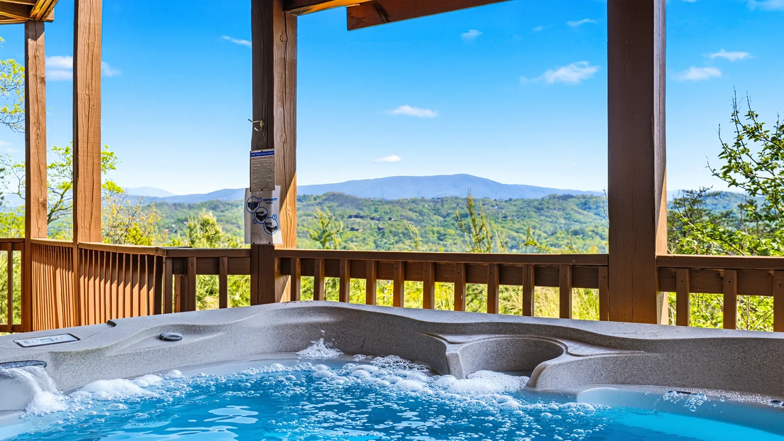 Relax to seemingly endless Smoky Mountain viws from your cabin hot tub.