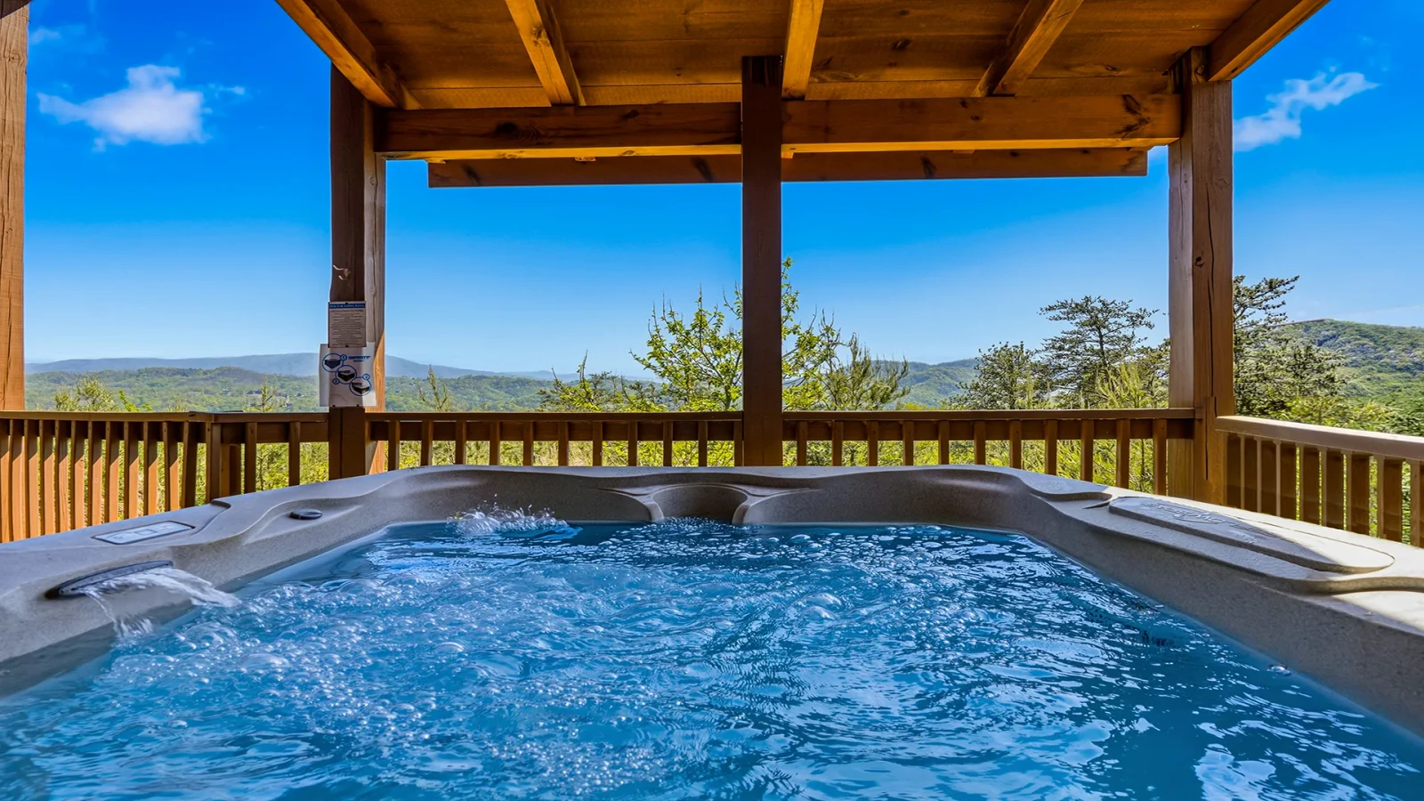 Take in endless mountain views from your cabin hot tub.