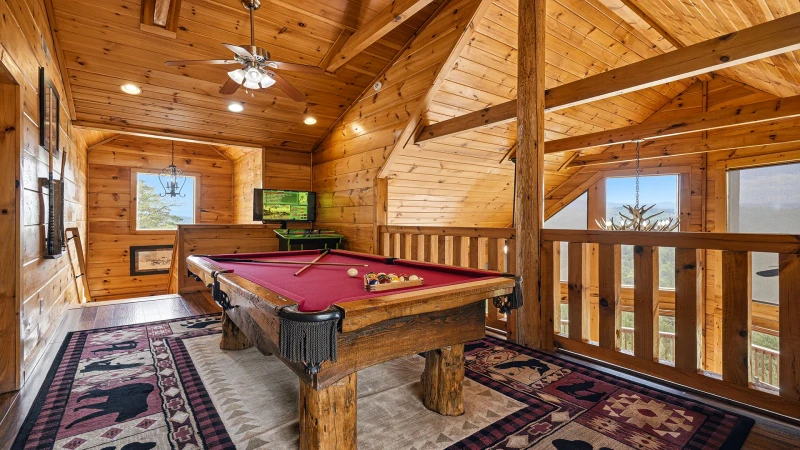 Loft pool table at your Smoky Mountains cabin.