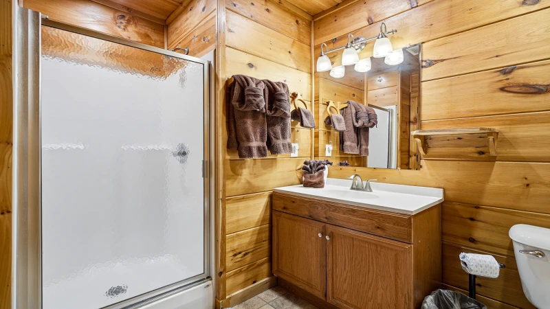 The full bath in your cabin's third bedroom.