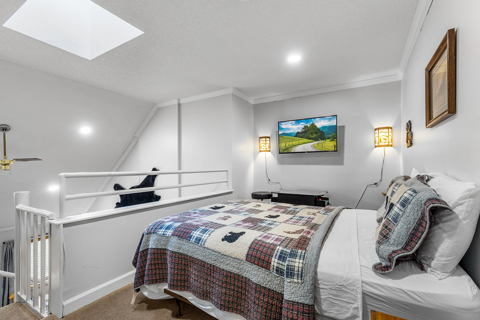 Large bed and tv in your condo in the Smokies.