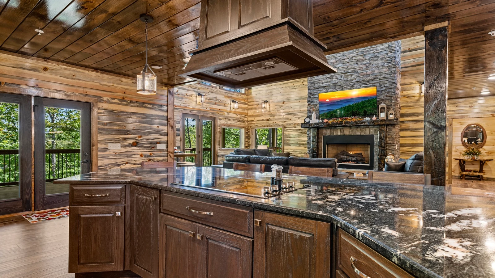 While preparing snacks and meals continue to enjoy the family with your Smoky Mountains cabin open floorplan.