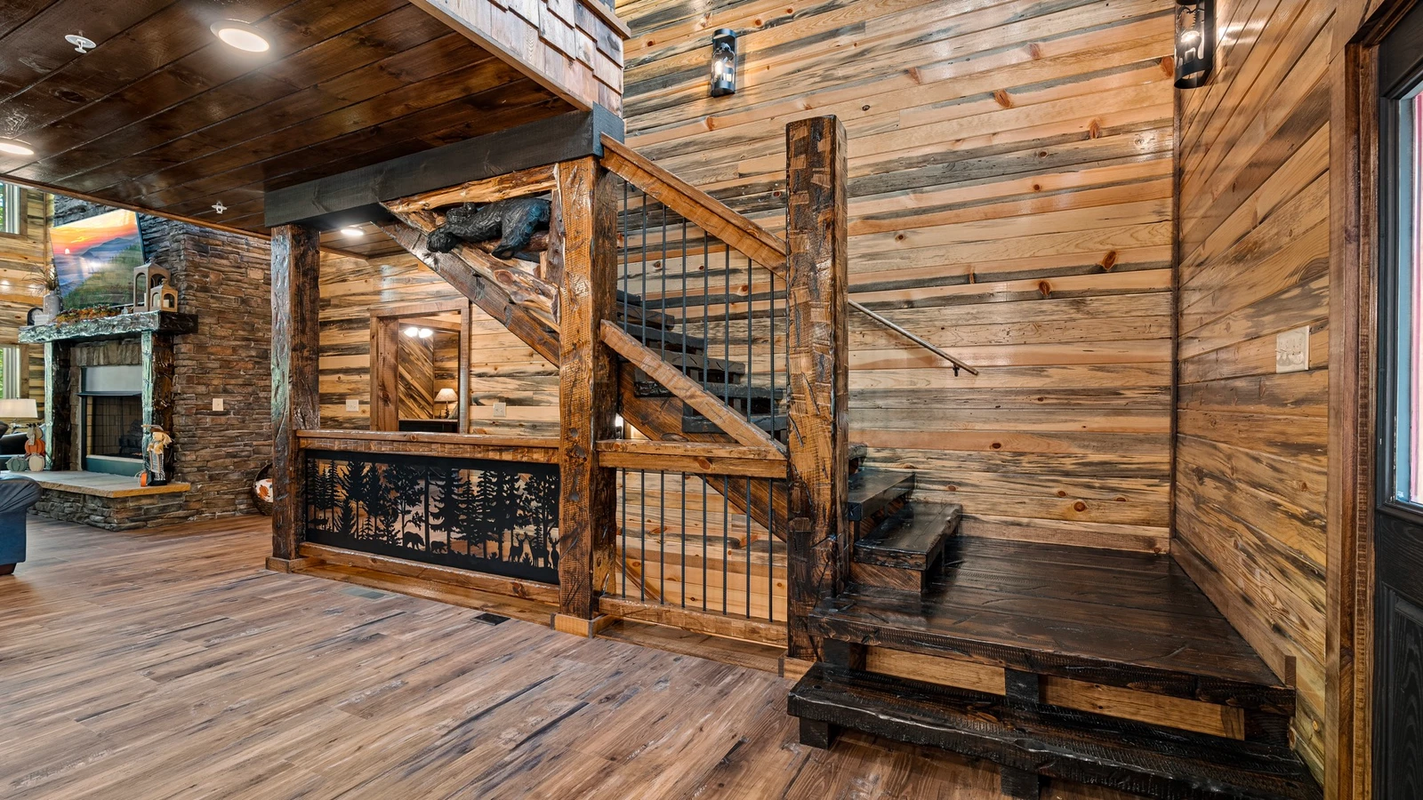 The grand stairway takes you upstairs to two large bedrooms.