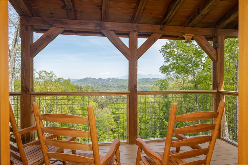 Relax outdoors with the Smoky Mountains in these relaxing rockers under the cabin's porch.
