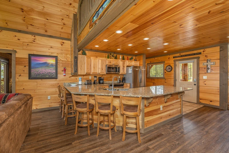 Smokies rental cabin with breakfast bar seating and more. 
