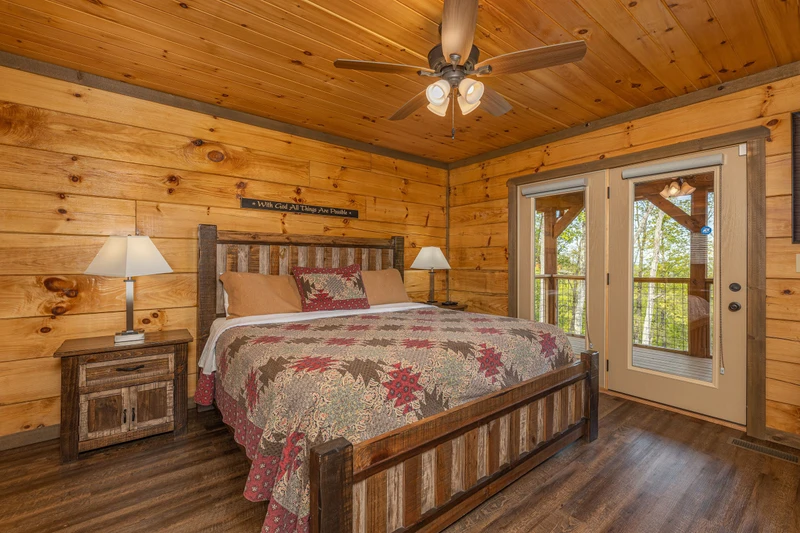 Rustic furnishings in your 5 bedroom cabin's second bedroom. 