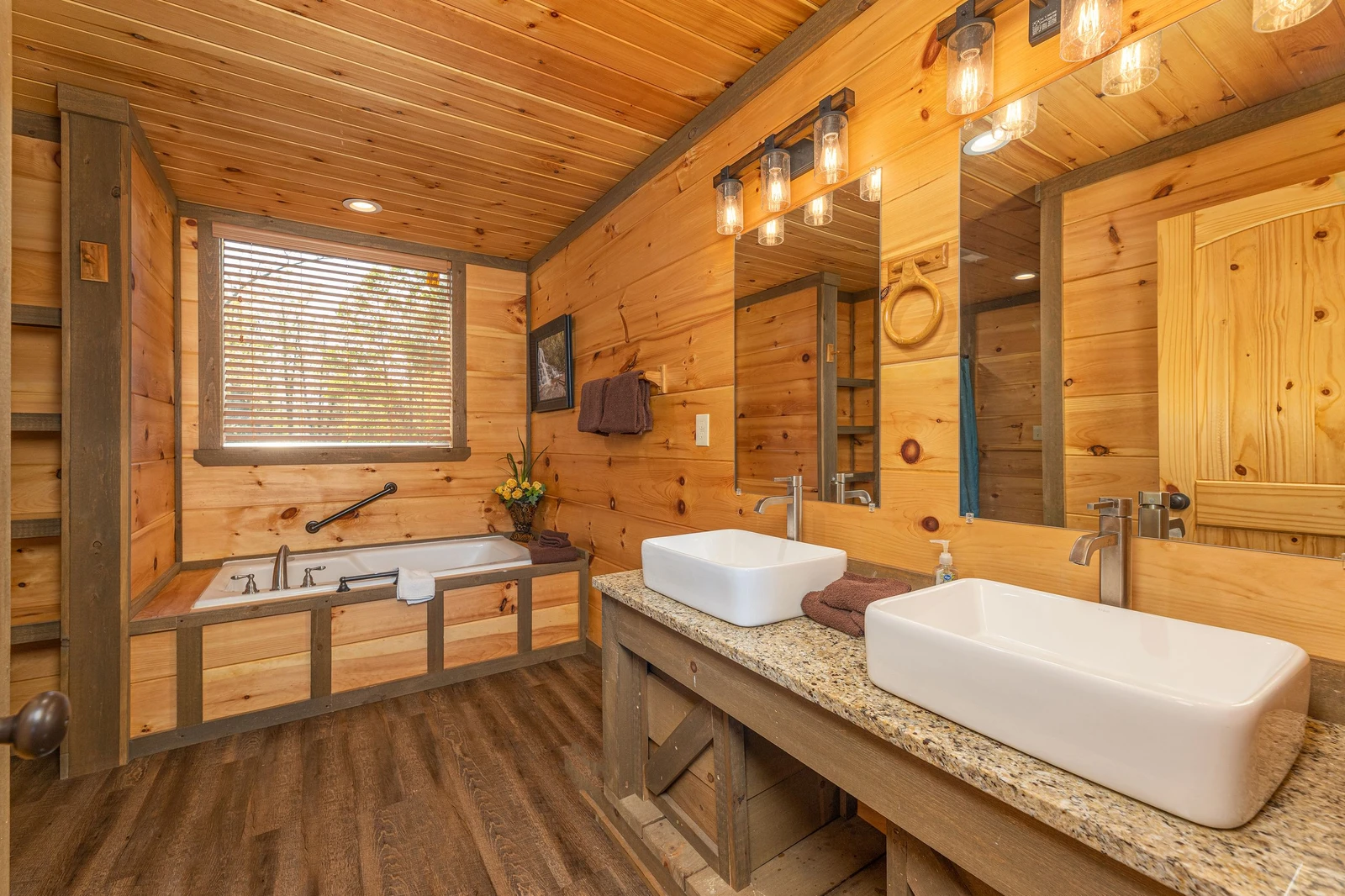 Second bedroom's bath with his and hers farm basins. 