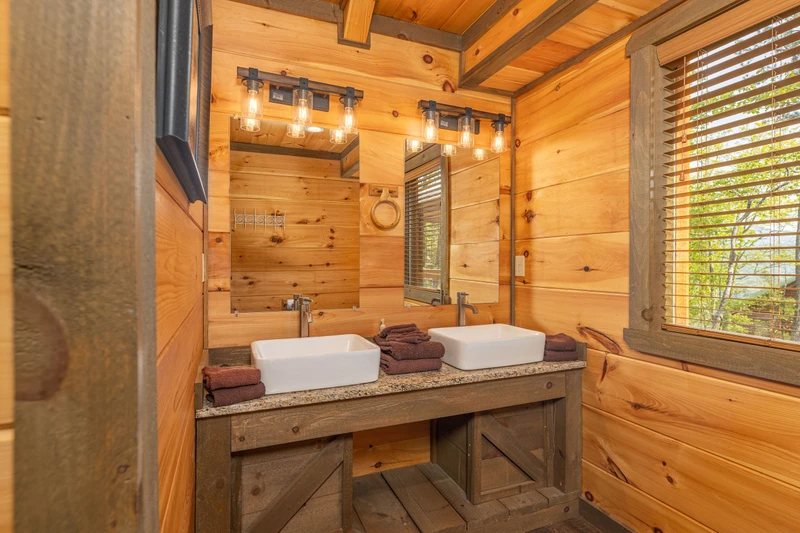 Dual farm sinks in the second upstairs bath.