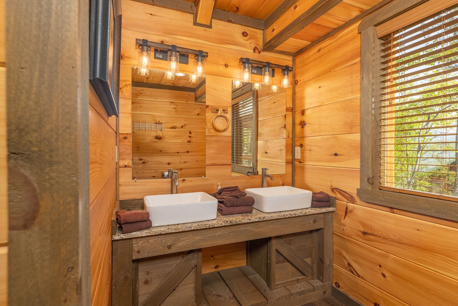 Dual farm sinks in the second upstairs bath.