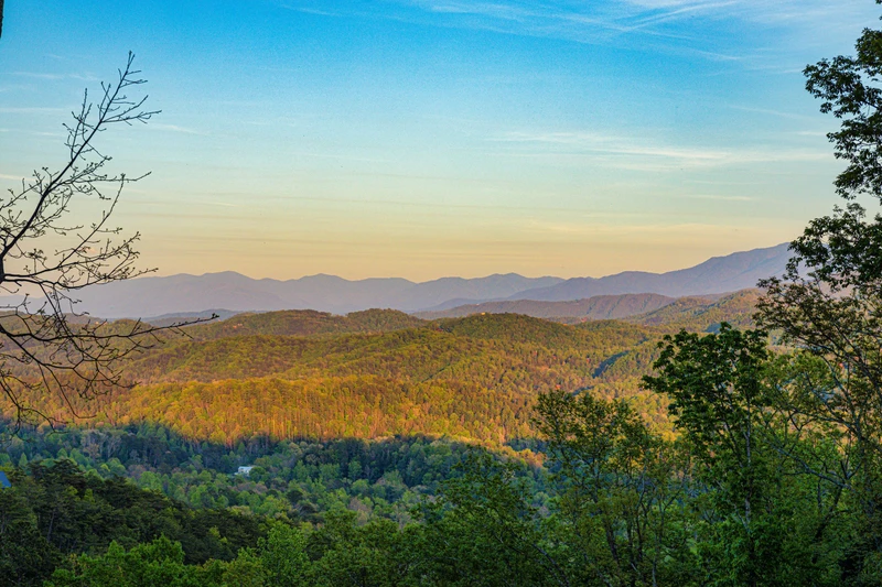 Let go of the everyday and take in endless Smoky Mountain views from your 5 bedroom log cabin, The Appalachian.