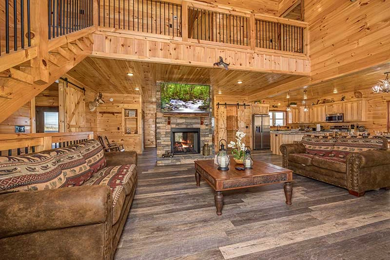Balcony view and fireplace from the cabin's Livingroom.
