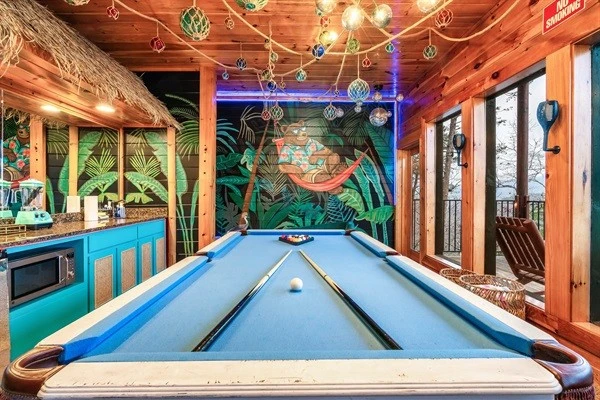Tropical Game Room: Enjoy friendly pool matches in this vibrant retreat with stunning views!