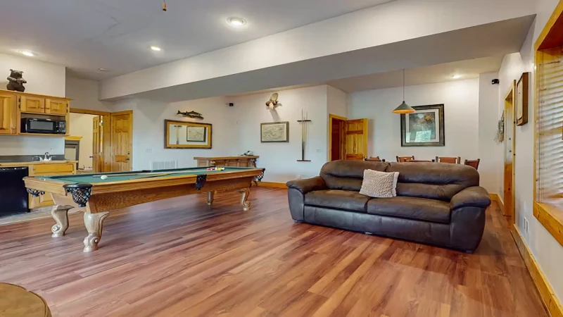 Game room featuring a pool table and poker table.
