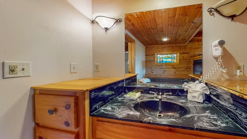 Cabin rentals large sink area in bedroom suite 1.