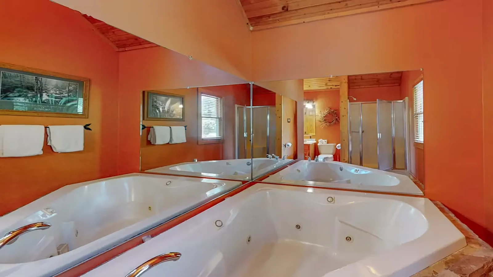 Suite featuring a romantic jacuzzi tub.