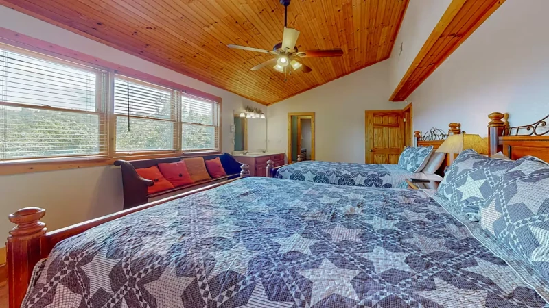 Roomy 4th bedroom with two queen size beds.