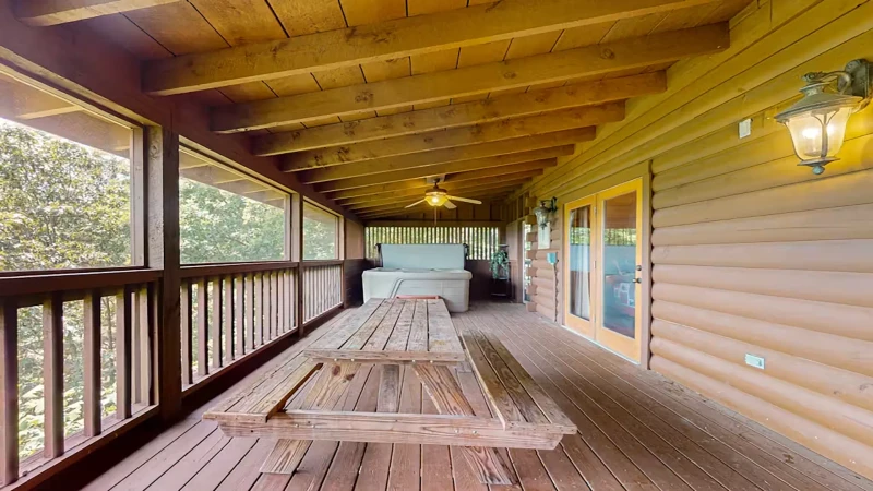 Eat outdoors under your cabin in the Smokies porch.