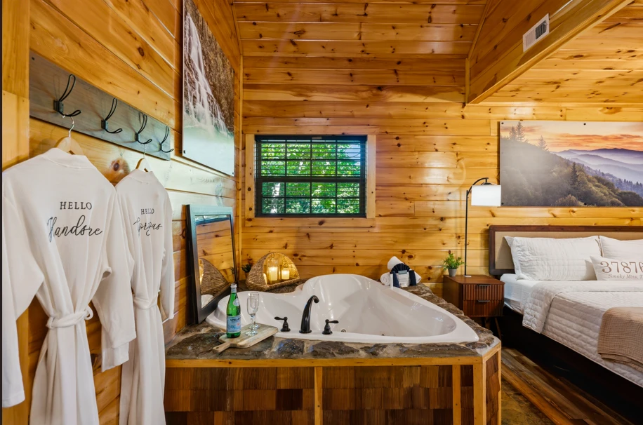 a heart‑shaped tub glowing in candlelight — the smokies’ most romantic view.