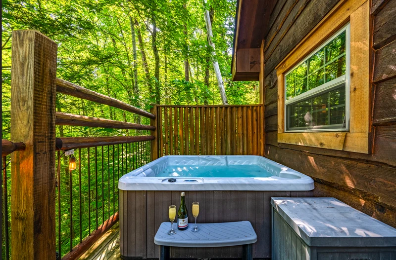 Unwind beneath the Smoky Mountain sky in your private treetop hot tub — the perfect ending to every Havenheart day.