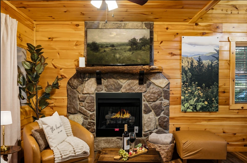 a cozy living room inspired by the calm of the smokies — firelit, connected, and ready for memories.