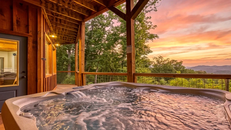 Feel the warmth and take in the views from your own Smoky Mountains rental cabin hot tub.