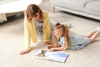 mom and daughter reading